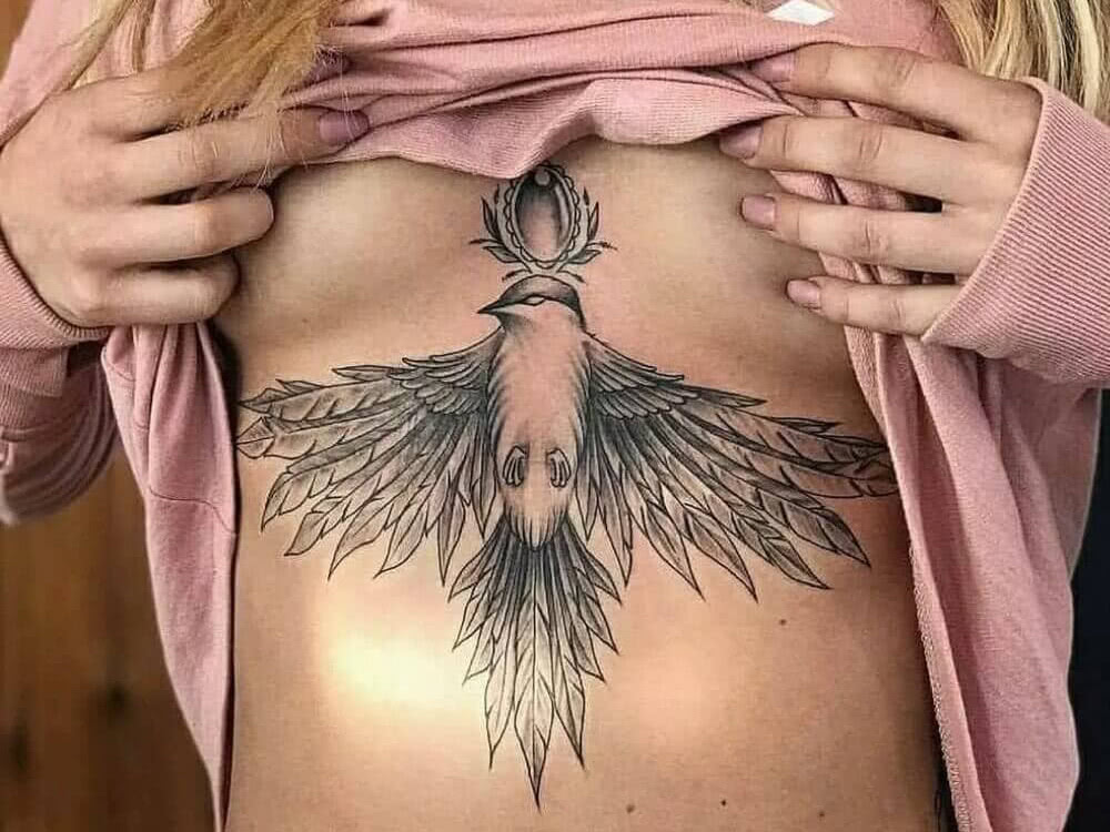 chest tattoo big bird