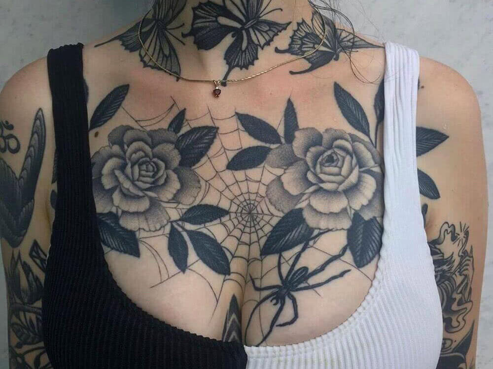 chest tattoo web flowers