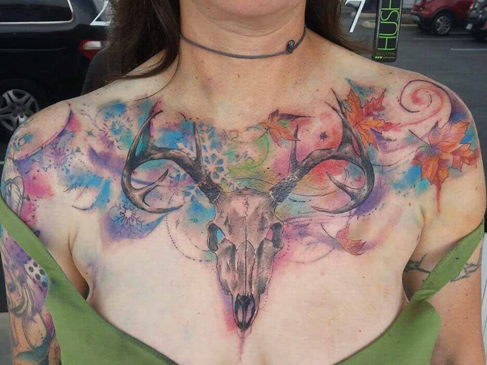 colorful chest tattoo animal skull